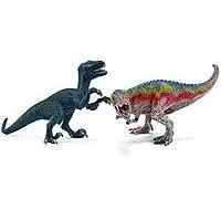 Kliknite za detalje - Schleich Figurice Dinosaurusi - Velociraptor i T-Rex, mali 42216