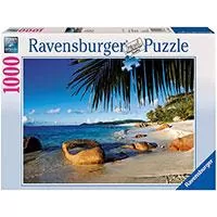 Kliknite za detalje - Ravensburger Puzzle 1000 delova - Iza palmi na Sejšelima 19018